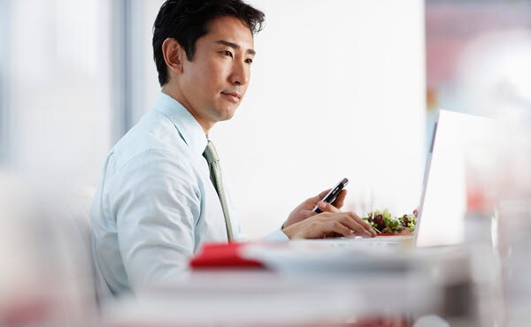 business man looking at laptop 