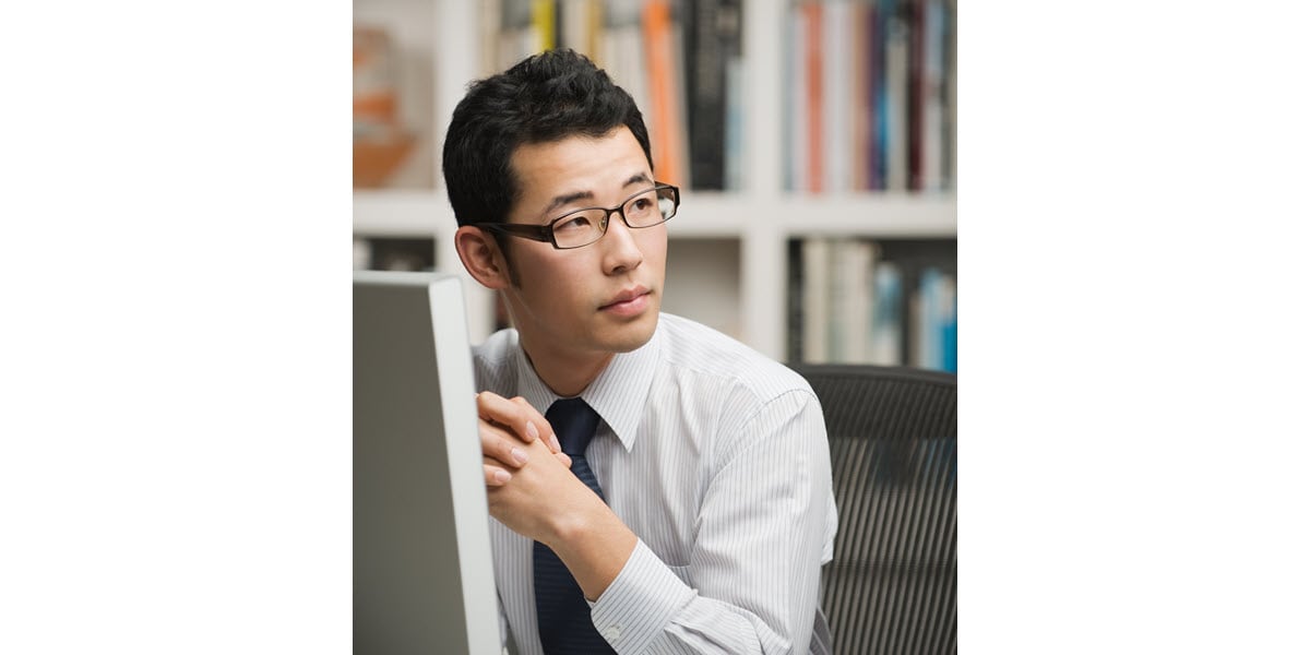 man working at work desk