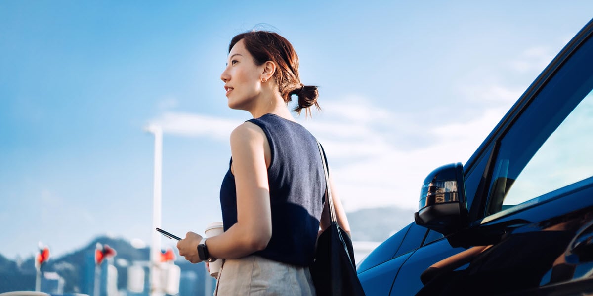 woman beside a car